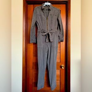 Universal thread long sleeve denim zipper jumpsuit with fabric tie belt.